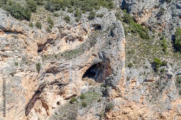 Fototapeta Devil's Window, an example of karst erosion on limestone rock in the Serrania de Cuenca Natural Park, Spain