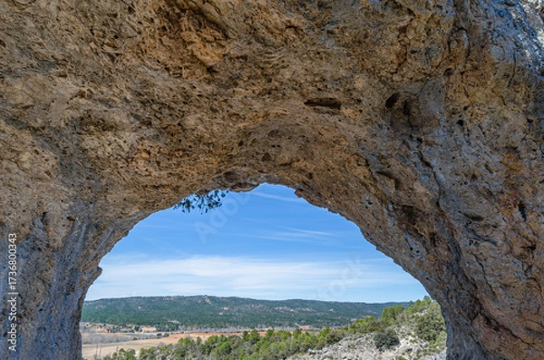 Fototapeta Devil's Window, an example of karst erosion on limestone rock in the Serrania de Cuenca Natural Park, Spain