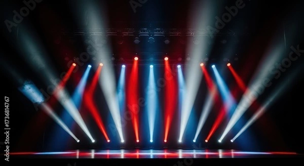 Fototapeta Vibrant concert stage illuminated by colorful beams of light spectacle atmosphere
