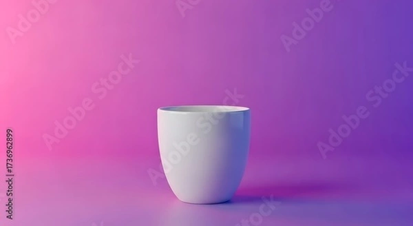 Fototapeta Minimalist white cup against a vibrant gradient backdrop design concept