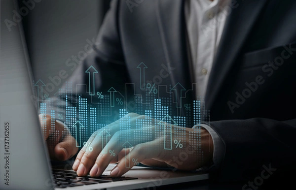 Obraz Laptop with glowing charts and arrows showing rising performance