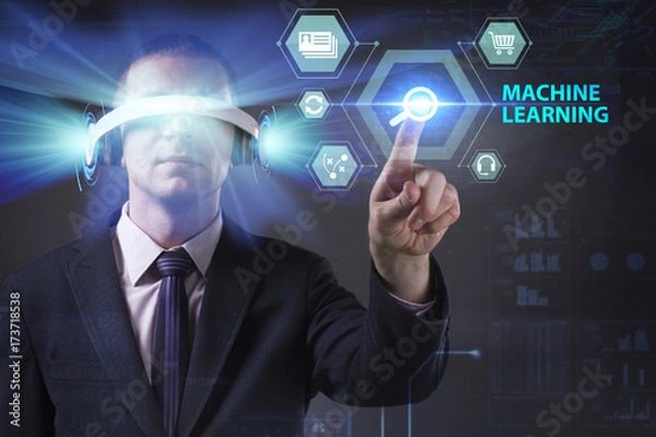 Fototapeta Business, Technology, Internet and network concept. Young businessman working in virtual reality glasses sees the inscription: Machine learning