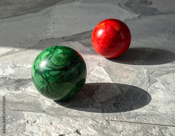 Obraz Two colorful spheres on a stone surface