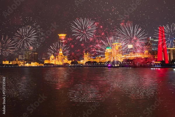 Fototapeta Golden retro clock tower and urban office buildings with Imperial crown of Westin Bund Center with fireworks - Shanghai, China