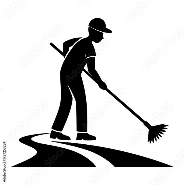 Fototapeta Person sweeping a path in silhouette
