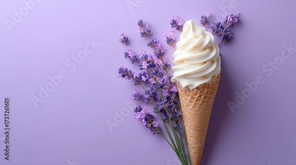 Fototapeta Waffle cone with soft serve ice cream on pastel lavender background, simple minimal composition, sweet summer vibe stock photo
