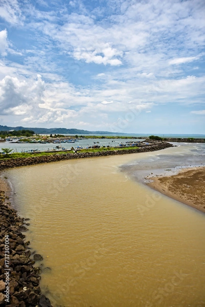 Fototapeta Panoramic view of the port and the Pangandaran seawall