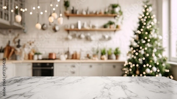 Fototapeta Marble kitchen countertop, with Christmas tree and festive lights in cozy kitchen background, copy space