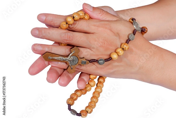 Fototapeta Woman praying rosary with folded hands, Hands in prayer with a rosary with a cross. Praying hands united for pray to God. isolated on transparent or white background