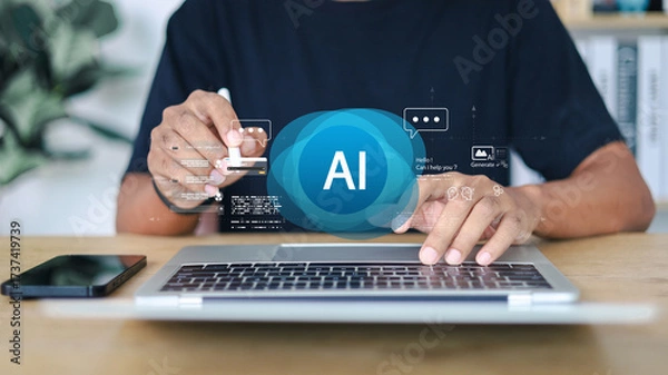 Fototapeta Person using laptop with AI chatbot and digital assistant icons overlay. Concept of artificial intelligence, workplace automation, innovation, customer service, and technology.