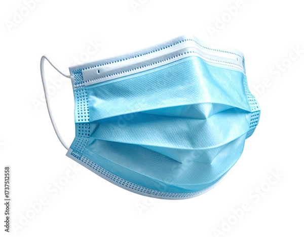 Fototapeta A light blue surgical mask on a black background, with ear loops and folds