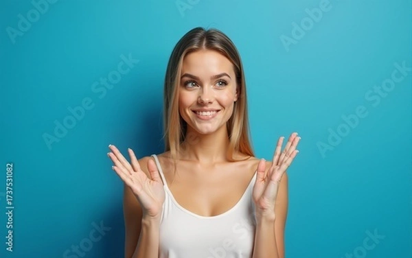 Obraz Young caucasian woman isolated on blue background doubting between two options. High quality