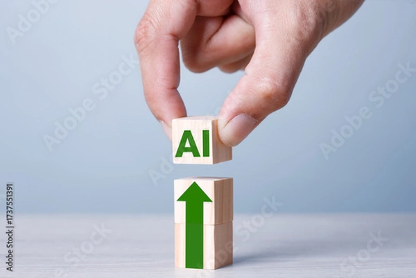 Fototapeta Hand holding "AI" word help symbolizing success and support in business concept. AI on top.