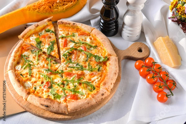 Fototapeta Pizza with pumpkin, cherry tomatoes and arugula