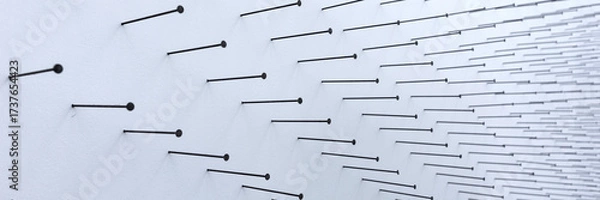 Obraz Panoramic image. Many nails in the white wall