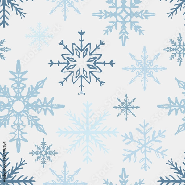 Fototapeta Hand drawn seamless pattern with blue snowflakes. Vector sketch illustration in vintage crayon textured style. Winter merry Christmas wrapping paper, winter background, textile