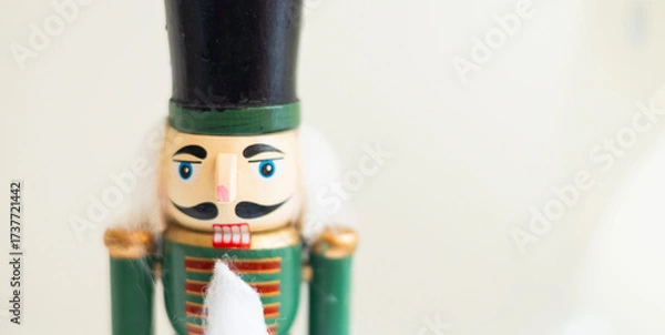Fototapeta Nutcracker close-up isolated on white background. Space for text.