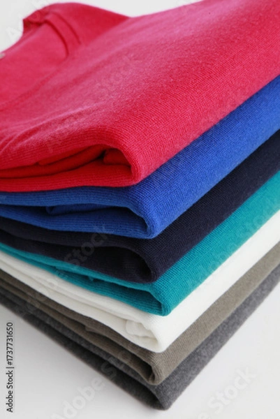 Fototapeta Stack of colorful folded sweaters