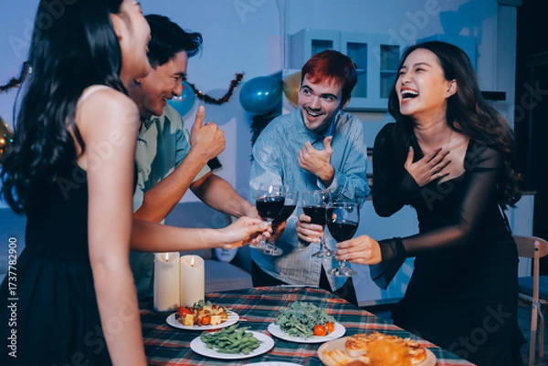 Fototapeta Diversity, dinner and group of people toast celebration together at party. Friends, happy and celebrate with food, wine and friendship for love, support and cheers champagne at business function