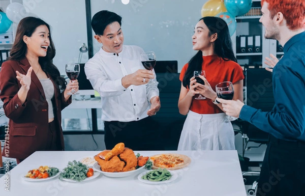 Fototapeta Diversity, dinner and group of people toast celebration together at party. Friends, happy and celebrate with food, wine and friendship for love, support and cheers champagne at business function
