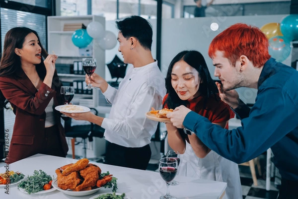 Fototapeta Diversity, dinner and group of people toast celebration together at party. Friends, happy and celebrate with food, wine and friendship for love, support and cheers champagne at business function