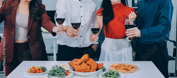 Fototapeta Diversity, dinner and group of people toast celebration together at party. Friends, happy and celebrate with food, wine and friendship for love, support and cheers champagne at business function