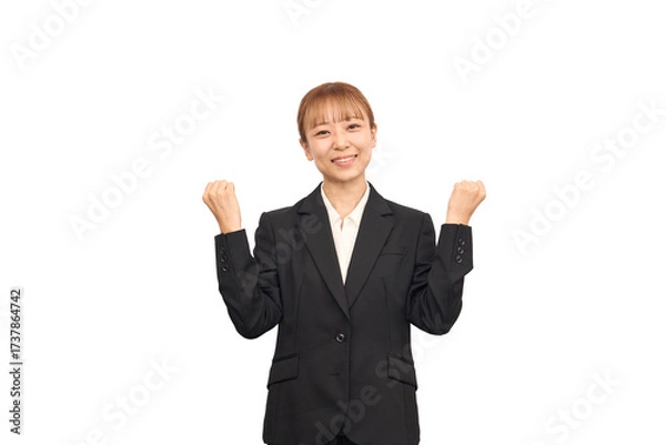 Obraz ビジネススーツを着た女性のガッツポーズ