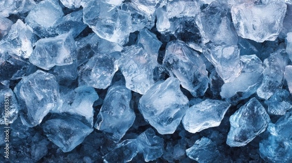 Fototapeta Top view of crushed ice pieces forming a cool refreshing background texture