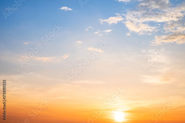 Fototapeta Beautiful , luxury soft gradient orange gold clouds and sunlight on the blue sky perfect for the background, take in evening,Twilight, Large size, high definition landscape photo