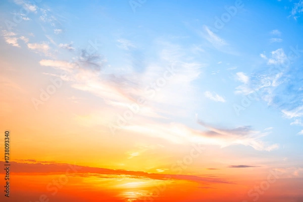 Obraz Beautiful , luxury soft gradient orange gold clouds and sunlight on the blue sky perfect for the background, take in evening,Twilight, Large size, high definition landscape photo