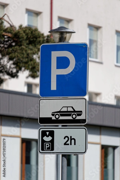 Fototapeta European Parking Sign with Car Front to Left Curb and Two Hours Limit