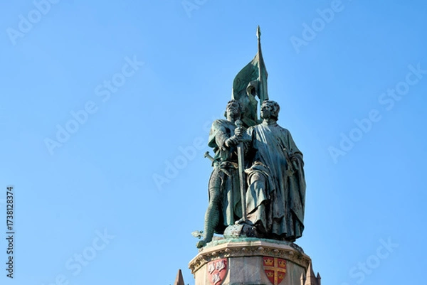 Fototapeta Bruges, Belgium – September 14, 2024 Jan Breydel and Pieter de Coninck Monument Bruges. Jan Breydel and Pieter de Coninck Monument in the Grote Markt, the market square of Bruges, Belgium. 
