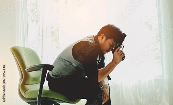 Fototapeta Hired gunman, sharpshooter, confident man with a gun, personal defense weapon, handgun.