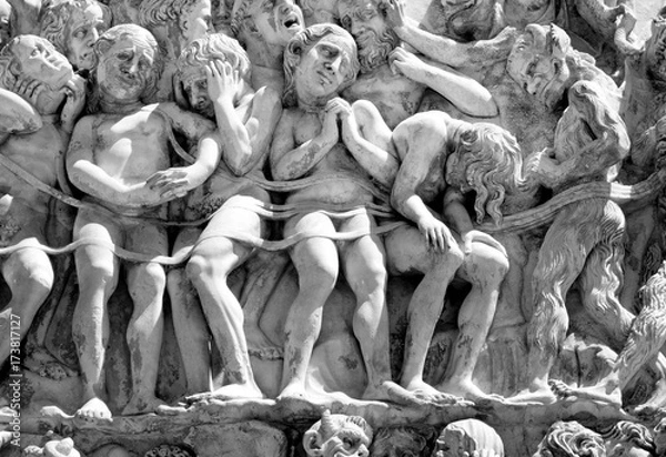 Obraz Waiting for Hell, bas relief in the Duomo of Orvieto, Italy, 2017.