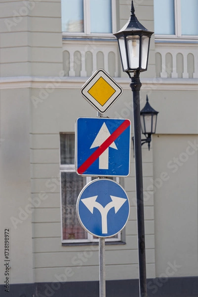 Fototapeta European Priority Road Sign with End of One Way and Mandatory Left or Right Turn