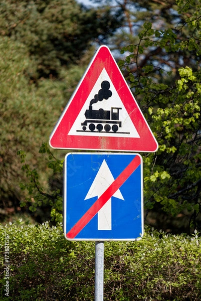 Fototapeta European Railway Crossing without Barrier and End of One Way Road Sign