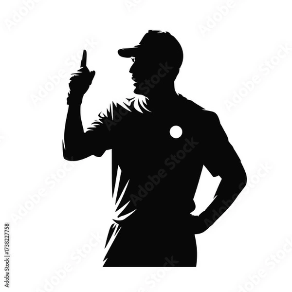 Fototapeta Silhouette of a man in a cap pointing upward with hand on hip