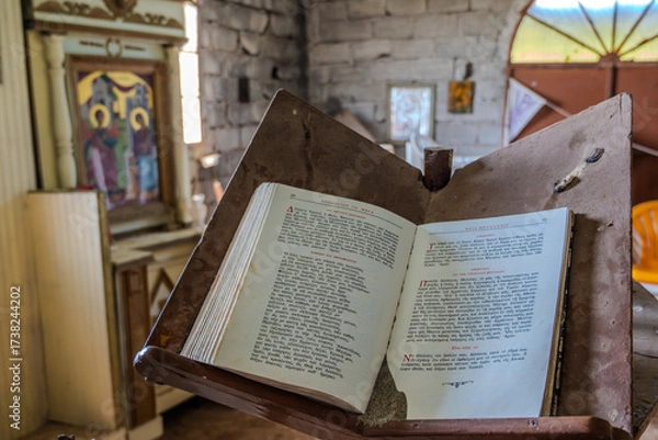 Fototapeta Open Religious Text on a Lectern Inside the Old Orthodox Church on Vardiani Island, Kefalonia