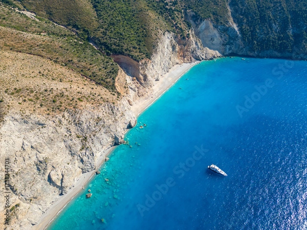 Fototapeta Aerial Vertical View of a Secluded Cove and Pristine Turquoise Water on the Northwest Kefalonia Coastline in Greece