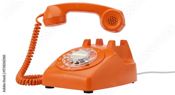 Fototapeta Isolated Vintage orange rotary telephone from the 1960s resting off the receiver against a neutral backdrop