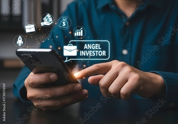 Fototapeta Person using smartphone with angel investor icon and other business related icons floating around it