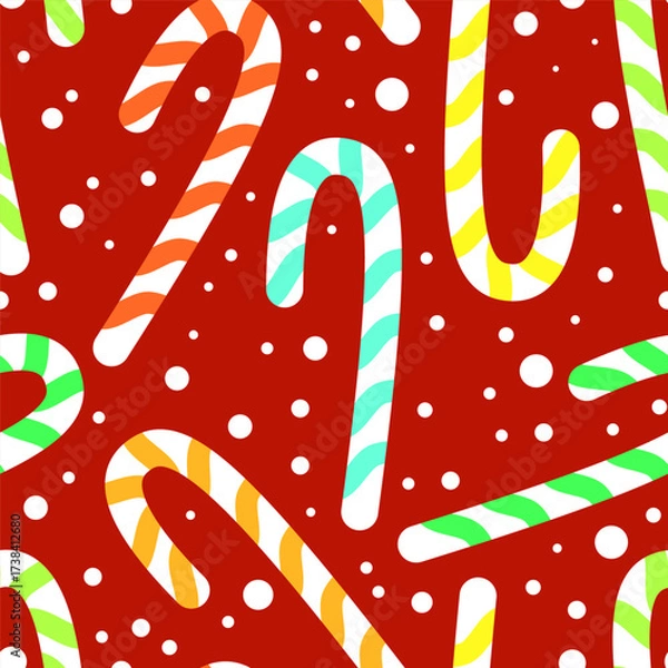 Fototapeta Seamless pattern of Christmas multicolored sugar canes with snow on a red background