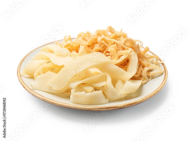 Fototapeta Dried shredded squid and shavings isolated on white