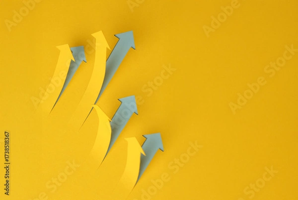 Fototapeta Multicoloured arrows pointing up and down. Symbolise growth progress, success in business finance. 