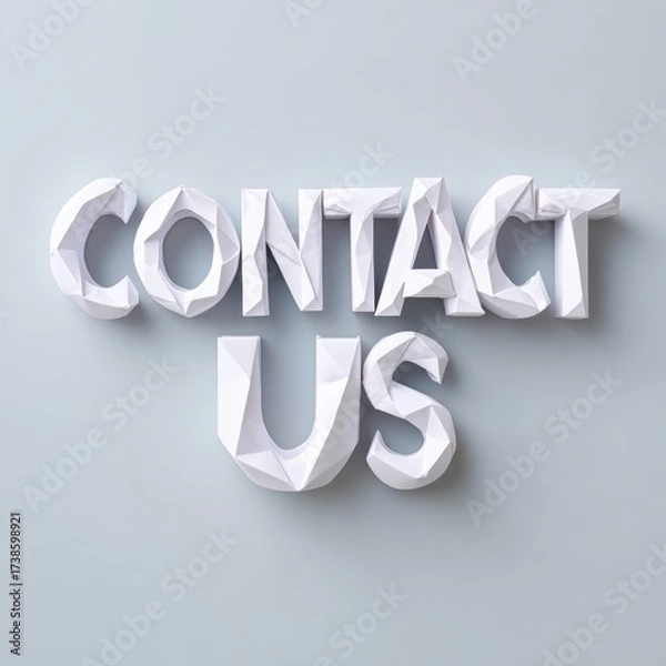 Fototapeta Origami-style 'Contact Us' letters in geometric white paper texture on soft background