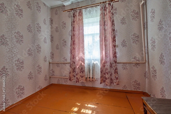 Fototapeta old empty room with a window