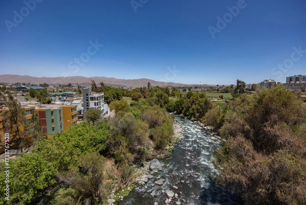 Fototapeta Photographs of the Arequipa viewpoint, mountains in the White City of Peru, panoramic view of the Misti and Chachani volcanoes, perfect for postcards.