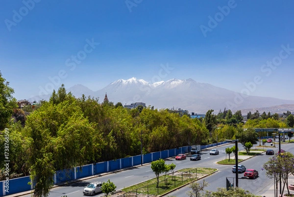 Fototapeta Photographs of the Arequipa viewpoint, mountains in the White City of Peru, panoramic view of the Misti and Chachani volcanoes, perfect for postcards.