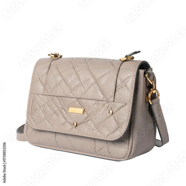 Obraz Stylish gray quilted shoulder bag, featuring gold hardware and a flap closure, presented against a black background, showcasing a sophisticated and elegant design, perfect for fashion and lifestyle...