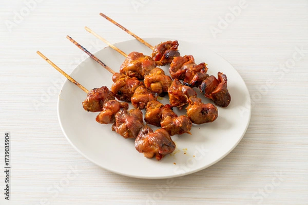 Fototapeta grilled chicken gizzard skewer yakitori serve in izakaya style